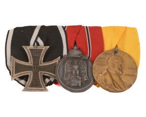 WWI and WWII combat veteran's 3 medal set mounted on ribbon bar -Iron Cross 2nd Class (EKII), Centenary Medal, Eastern Front Medal (Winterschlacht im Osten 1941/42)